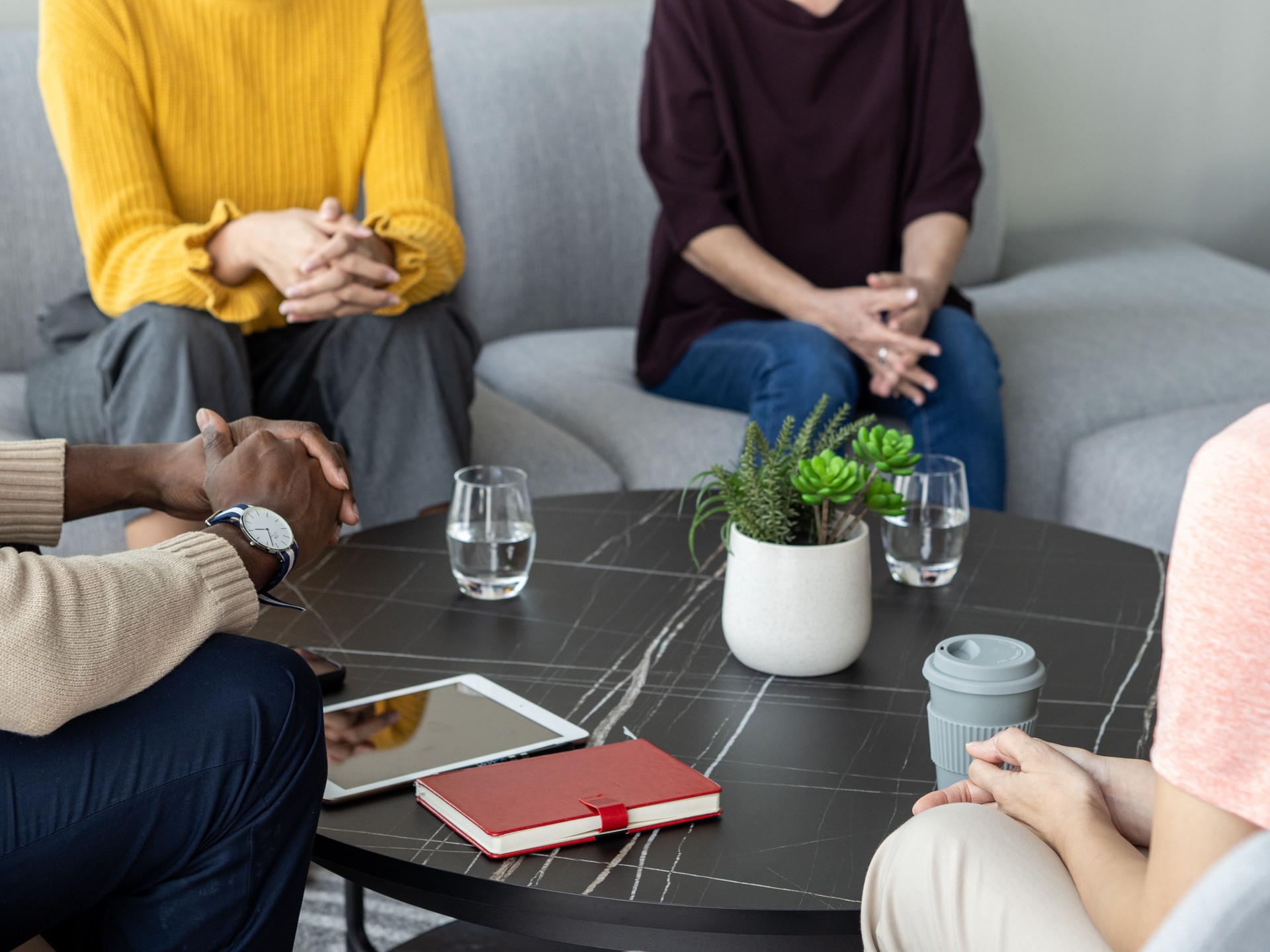 Mental Wellness - Diverse participants at mental health workshop seated in a small circle